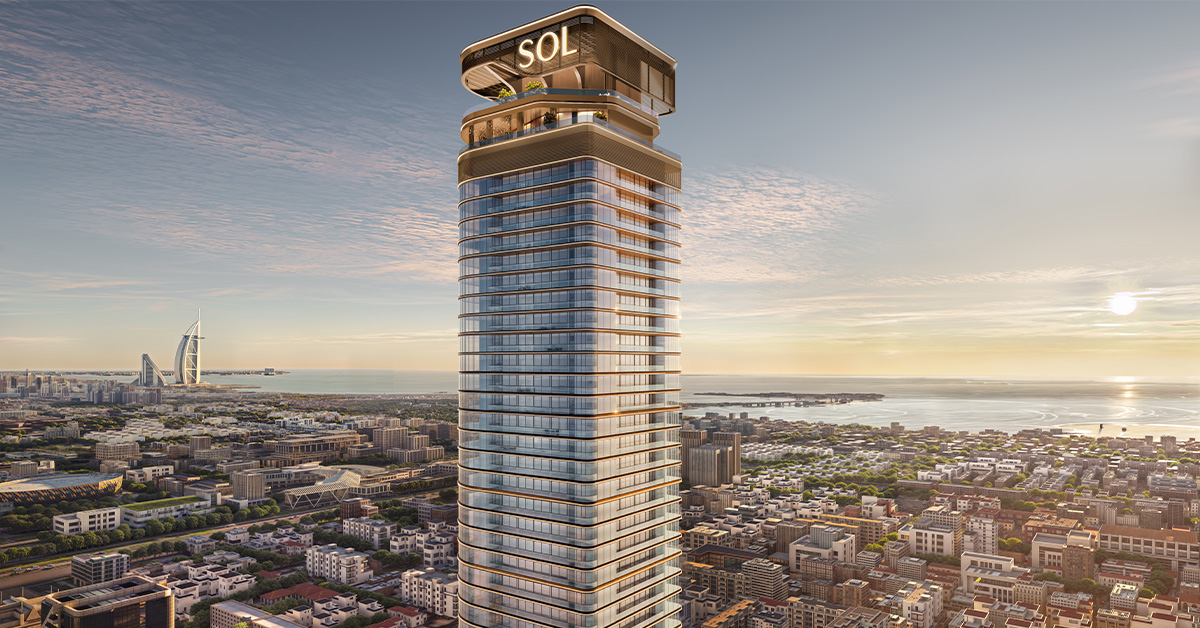 SOL LUXE tower on Sheikh Zayed Road with Burj Al Arab and Dubai coastline at sunset